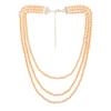 Estele – Dreireihige Halskette mit goldenen Perlen