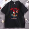 Dont Be A Chicken Lollipop TShirt Funny Pun Humor Tee Bold Sarcastic Graphic Shirt Hilarious Gag Gift Idea for Unisex Women