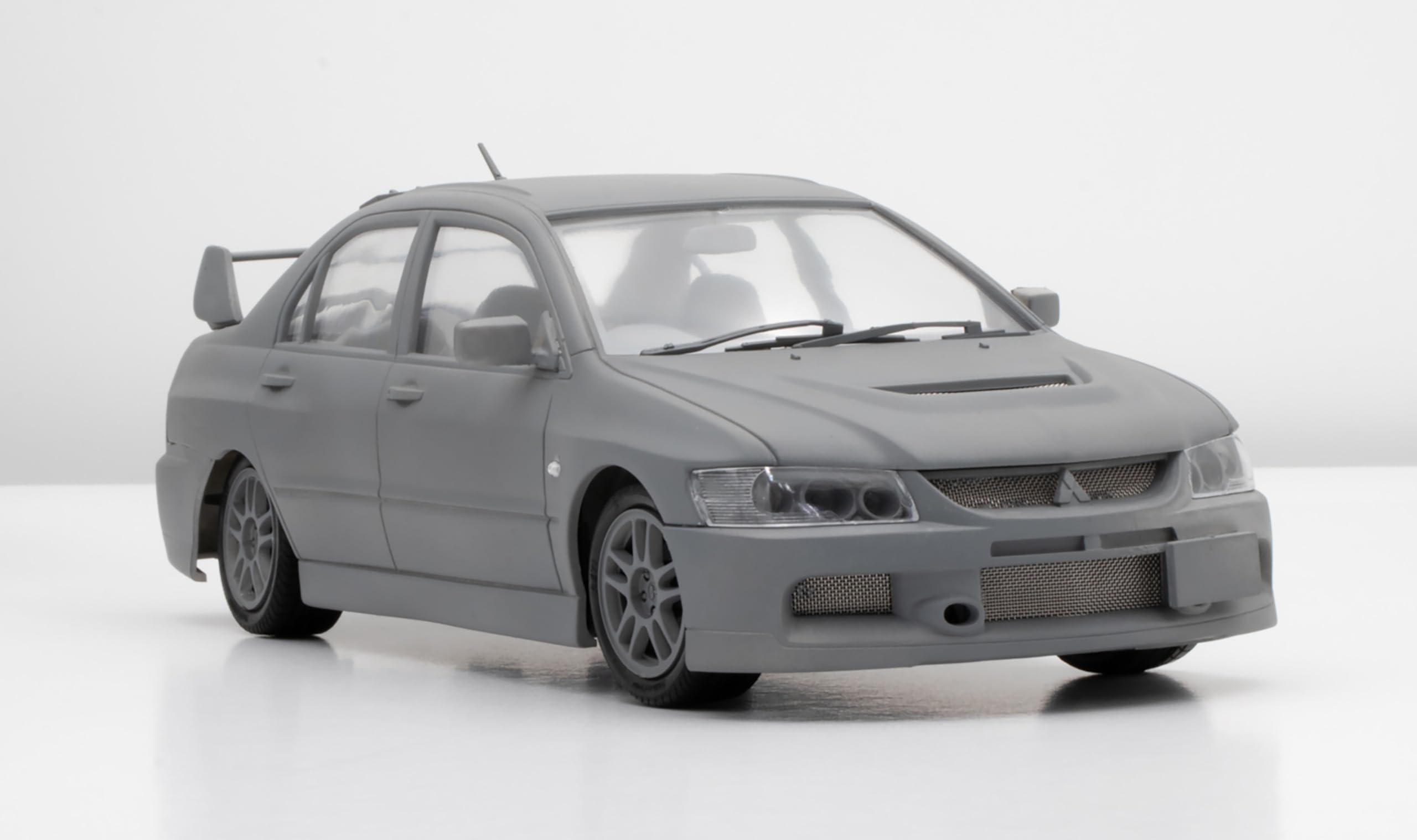 

Серия Туге Mitsubishi Lancer Evolution IX GSR Пластиковая модель 1/24 №9 белый