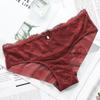 Ropa interior de encaje estilo europeo y americano con entrepierna de algodón ahuecada transpirable de talle medio para mujer