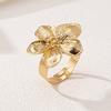 A Women's Ring with a Flower Design, Made of Metal and Adjustable In Size, Suitable for Everyday Wear and Holidays