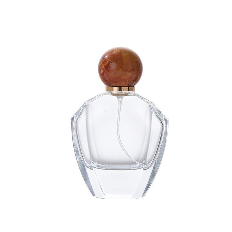 Elegant Transparent Glass Perfume Bottle with Round-Edge Polygon Design and Thick Base