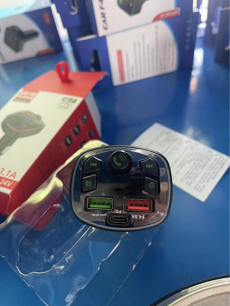 Car Bluetooth MP3 Player with Hands-Free Call, Voice Broadcast, PD Fast Charging, and USB Flash Drive.