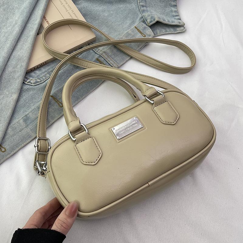 New Korean version niche versatile foreign style portable bowling bag women commute to work advanced sense messenger bag bag