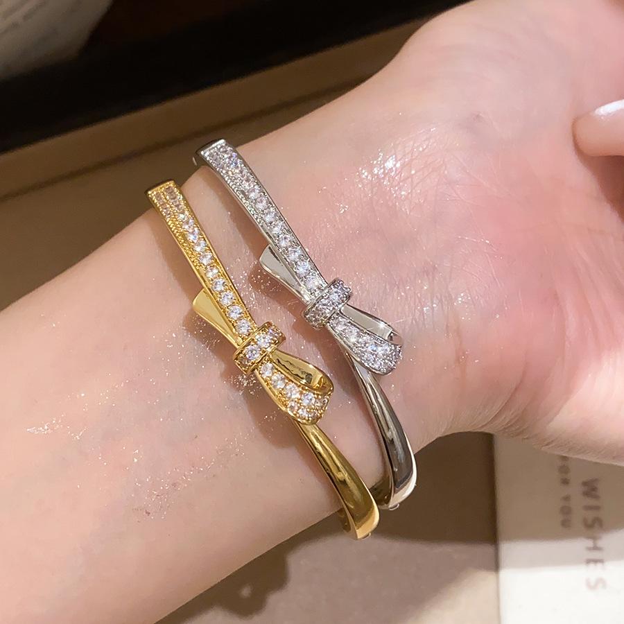 18k Gold Plated Oval Bracelet with Diamond Inlay - Butterfly Knot Design