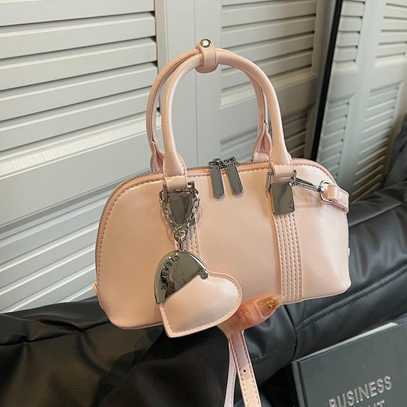

Luxury Designer Square Handbag Korean Popular Women Versatile One Shoulder Crossbody Bags Chic Elegant Bowling Bag with Pendant (20cm<Max Length<30cm) розовый