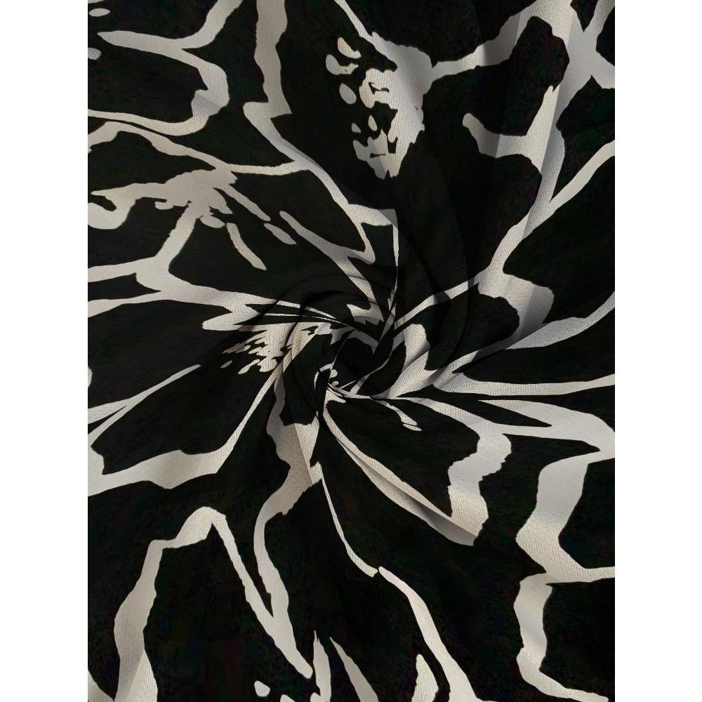 Women's large size with pocket design black and white abstract printed long-sleeved loose top, fashionable versatile casual T-shirt