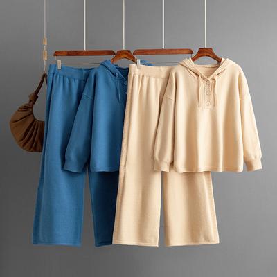 A New Autumn and Winter Knitwear Set Featuring A Hooded, Loose-buttoned Sweater and Wide-leg Pants for Women
