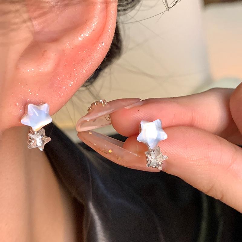 

Small fresh blue star stud earrings female sweet niche design exquisite earrings 925 silver needle ears
