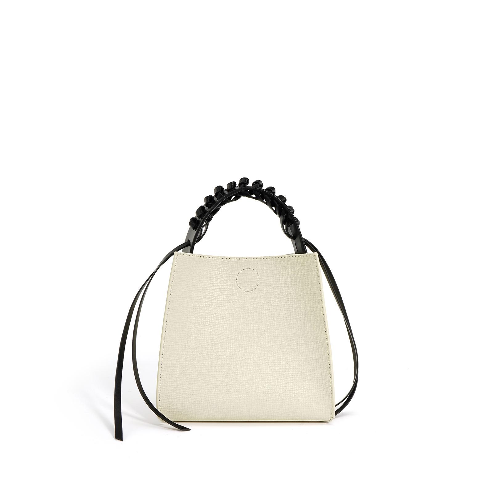 

Новый нишевый дизайн Простая мода Высокий класс Портативная сумка-мессенджер двойного назначения для женщин