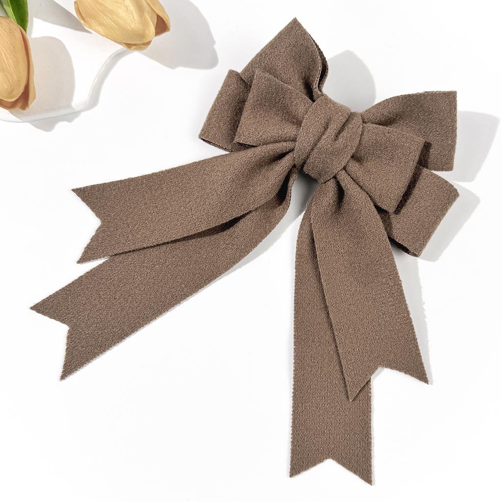 A Solid Woolen Bow Hair Clip for Autumn and Winter, a Fashionable, Simple and High-end Hair Accessory for Women