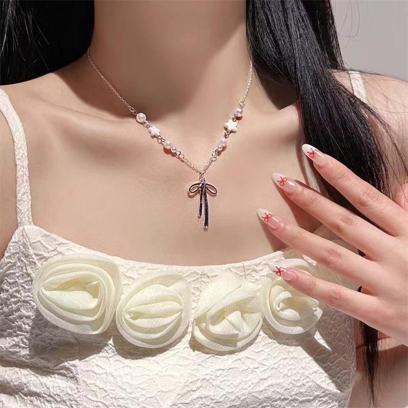 Trendige Perlen-Knoten-Halskette für Damen Elegantes Stern-Schleifen-Quasten-Choker-Schlüsselbein-Kette Party-Schmuck Geschenk