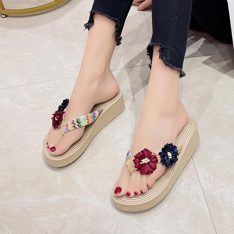 Ins Internet celebrity summer imitation straw hemp sole flower flip-flops women's fashion trend pinch foot thick sole beach shoes