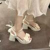In the summer of 2025, the new popular foreign-style pearls with sandals, women wear fairy style with skirts and high heels.