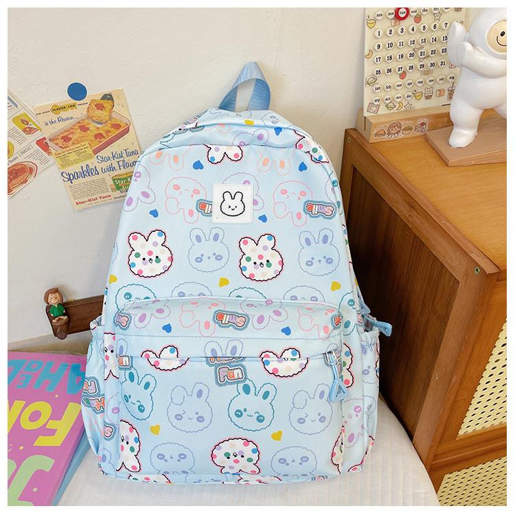 Stylish And Spacious Nylon Backpack For Middle School Girls With Trendy Letter Design синий