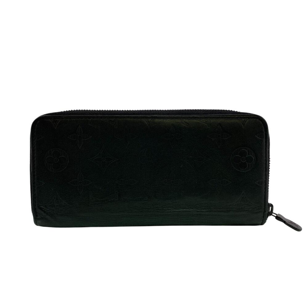 

LOUIS VUITTON M62902 Zip Around Monogram shadow leather Zippy Wallet Vertical Purse black leather Used