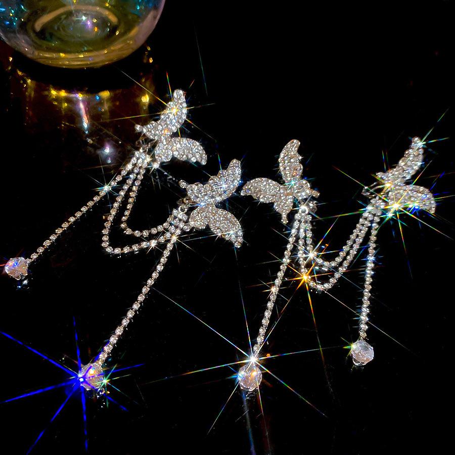 Diamond-set asymmetrical butterfly fringed ear clips, versatile exaggerated ear bone clips without ear piercings, light luxury earrings, earrings.