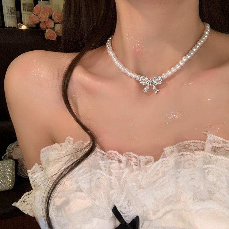 French temperament pearl necklace women's 2025 new diamond-encrusted bow collarbone chain light luxury high-end dress accessories