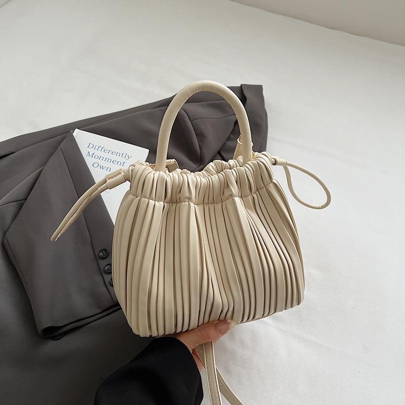

Korean casual foreign style hand bag women s 2025 autumn new simple bucket bag niche fashionable messenger bag