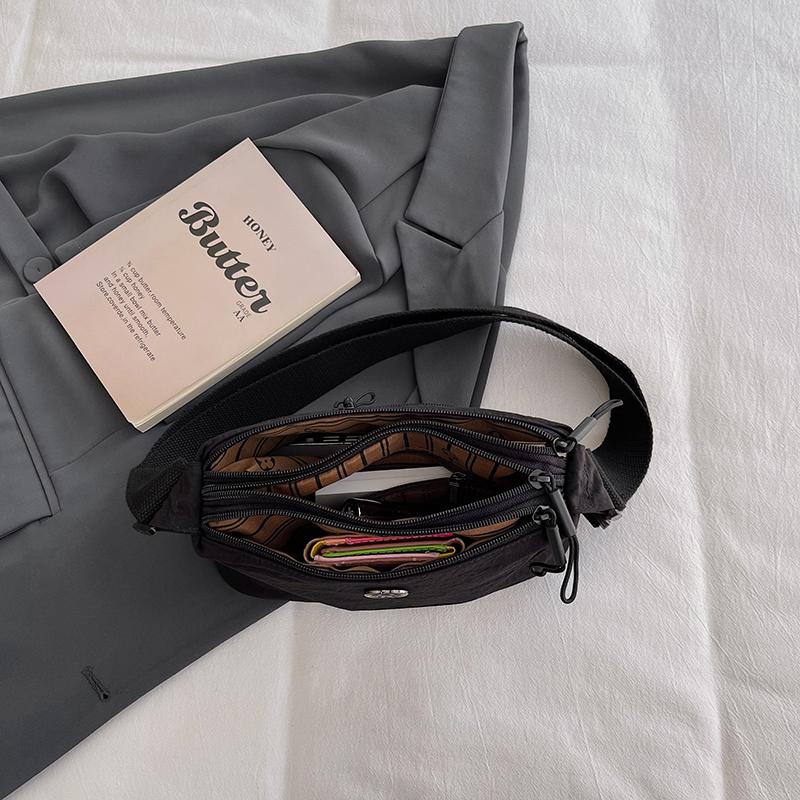 Multi-layer large-capacity lightweight and simple solid-color fashiable single-shoulder versatile casual sports crossbody bag