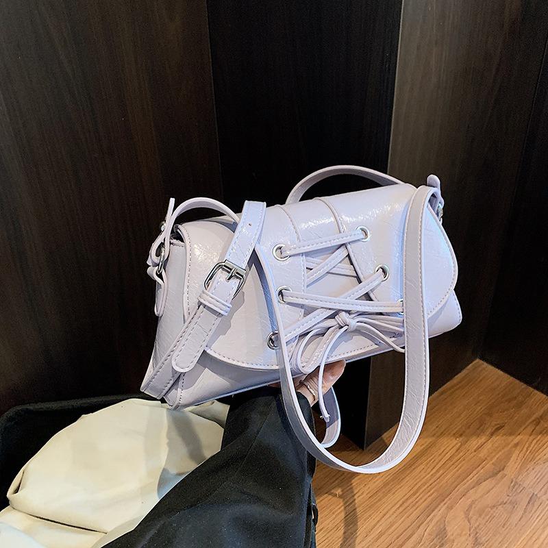 

Summer daughter style white shoulder armpit bag women s new versatile high-end niche messenger bag синій