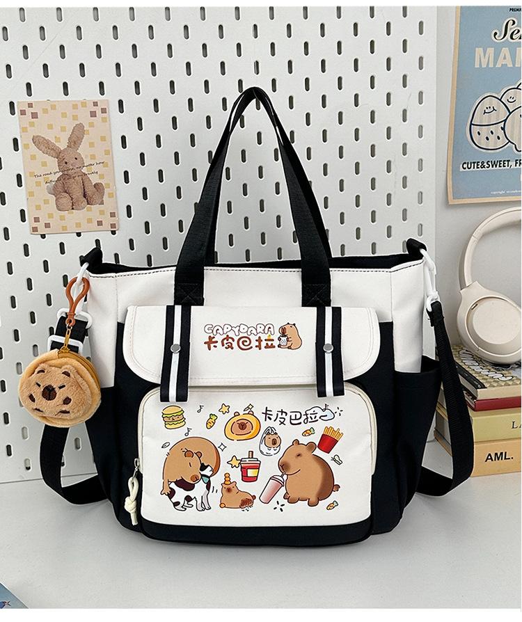 School bag 2025 new large-capacity cartoon multi-compartment high-value school bag Korean version commuting simple make-up bag lightweight backpack