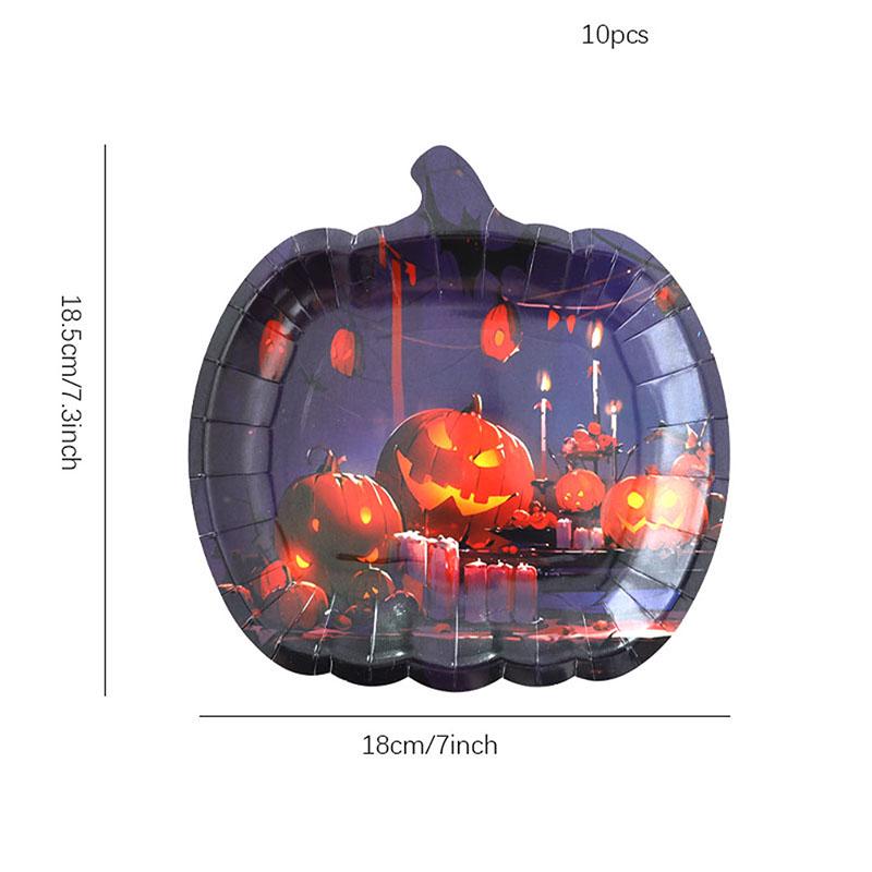 Zestaw zastawy stołowej na imprezę tematyczną Halloween: Obrus dyniowy, Talerzyki i kubki jednorazowe