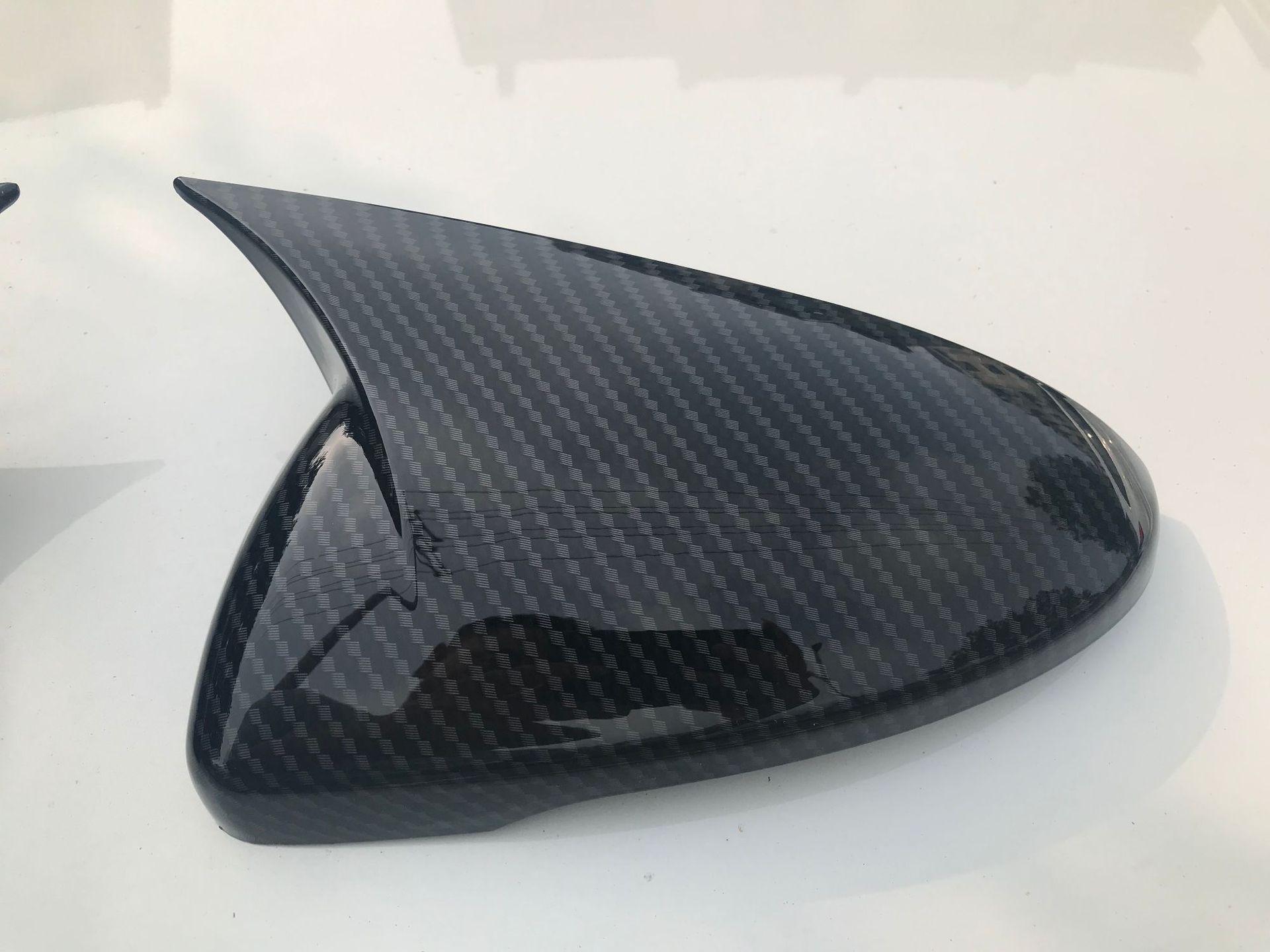 

Kia K3 2019-2022 Защитная крышка зеркала заднего вида в стиле рога с рисунком из углеродного волокна