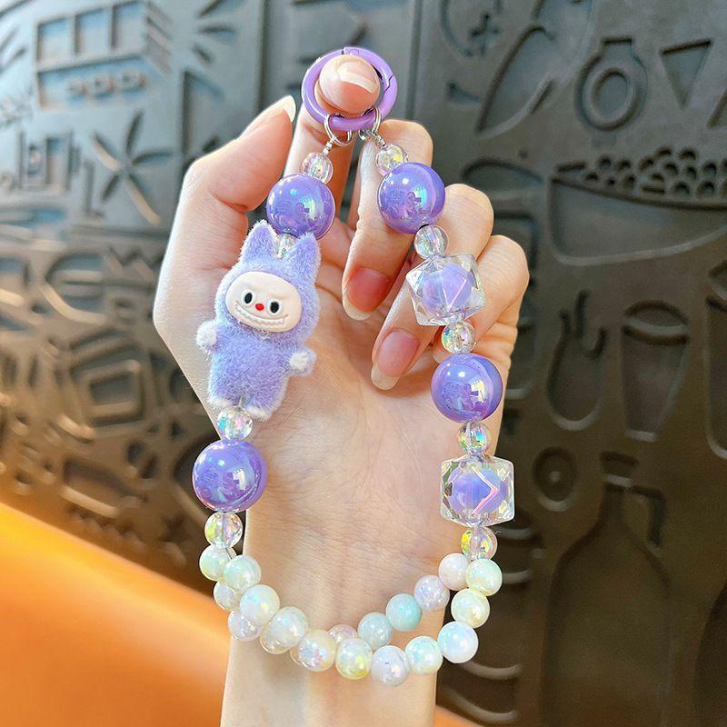 

Creative flocking modified doll cloth double line bead phone chain keychain cute bag car pendant фиолетовый