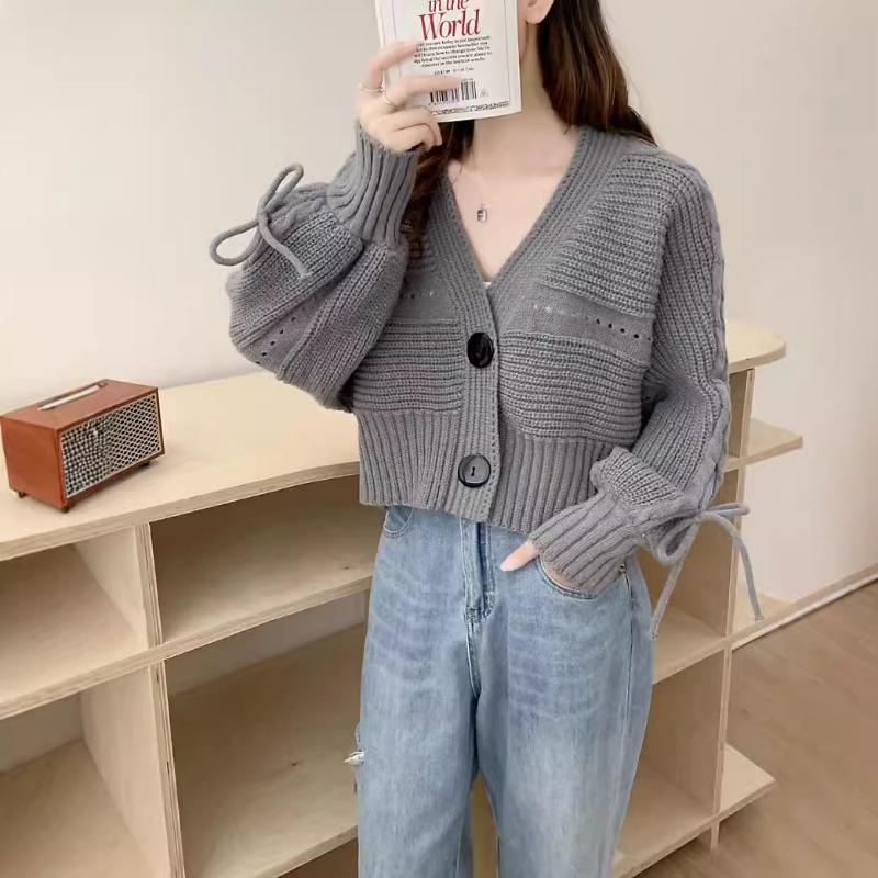 Autumn and winter new casual loose V-neck knitted cardigan sweater women's long-sleeved bow tether short top