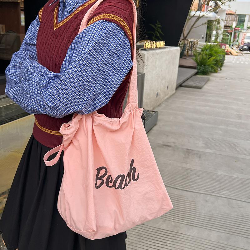 Korean Version of the New Letter Printing Bag Women's Large-capacity Nylon Shoulder Bag Casual Fashion Portable Drawstring Tote Bag