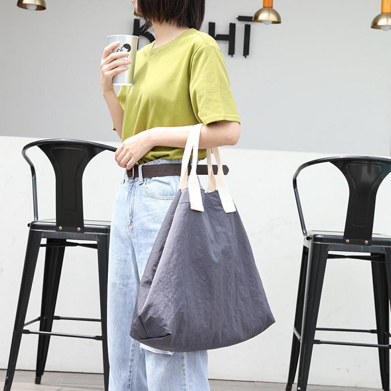 IELGY Korean version of casual large-capacity nylon handbag, simple literary Mori canvas bag