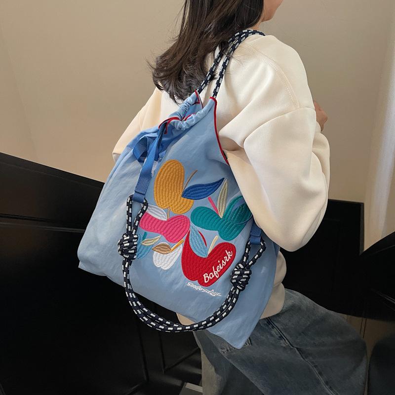 Xia Shangxin embroidered bag 2025 new Japanese cartoon shoulder shopping bag women's large-capacity versatile commuter bag