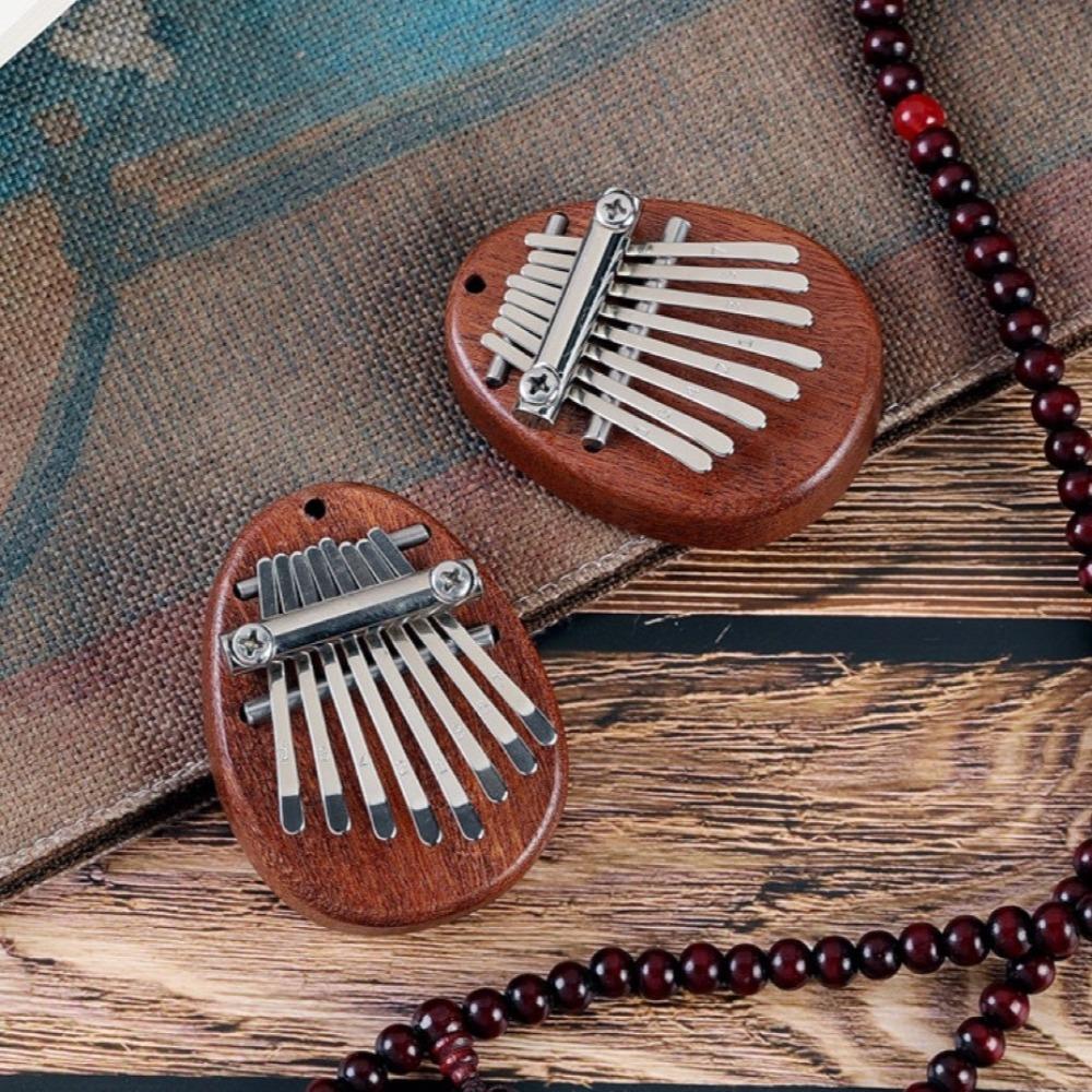 Easy-to-Learn Finger Piano Mini Hand Piano Finger Harp Thumb Piano Necklace  Beginners