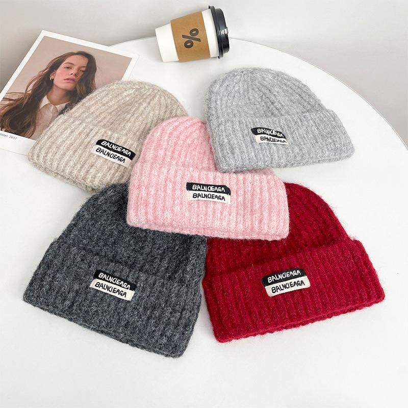Cloth label letter knitted hat women's autumn and winter warm ear protection cycling cold hat couple versatile loose wool hat
