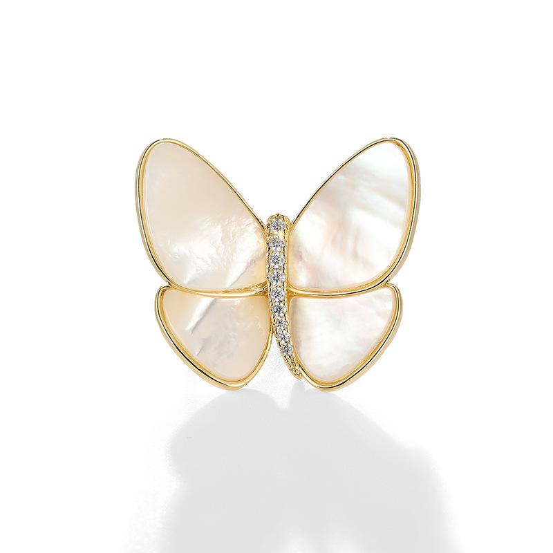 

Брошь-бабочка из натуральной морской ракушки: Идеально подходит для подарка на День матери.