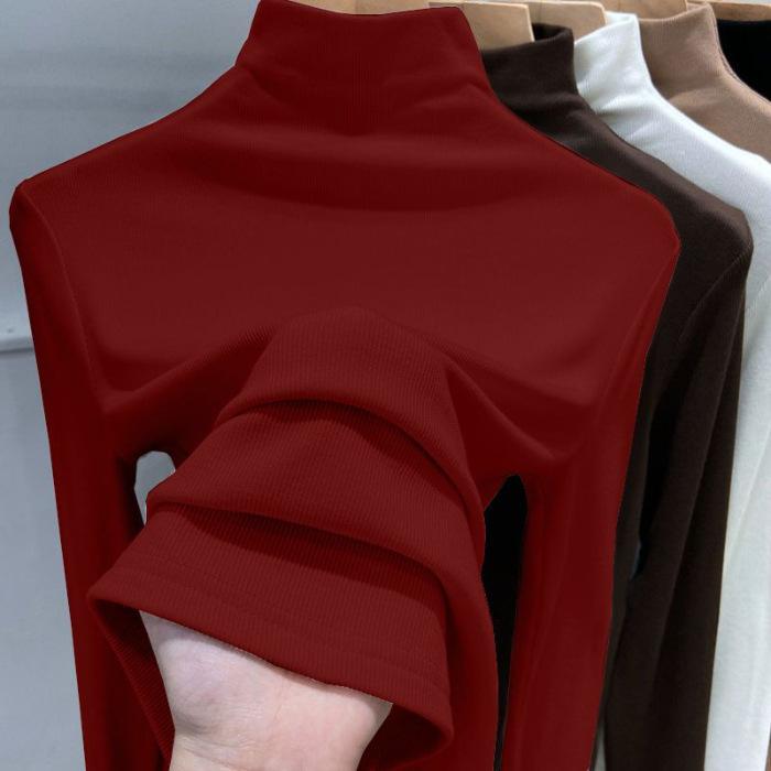 Damski prążkowany top bazowy z półgolfem, z długim rękawem. Modny na wiosnę, jesień i zimę. Dopasowany krój. Top wewnętrzny wykonany z dralonu.