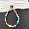 Colorful Puppy Head Camera Beaded Lanyard Pendant for Mobile Phones. Handmade and Cute for DIY Enthusiasts. Great for Female Users.