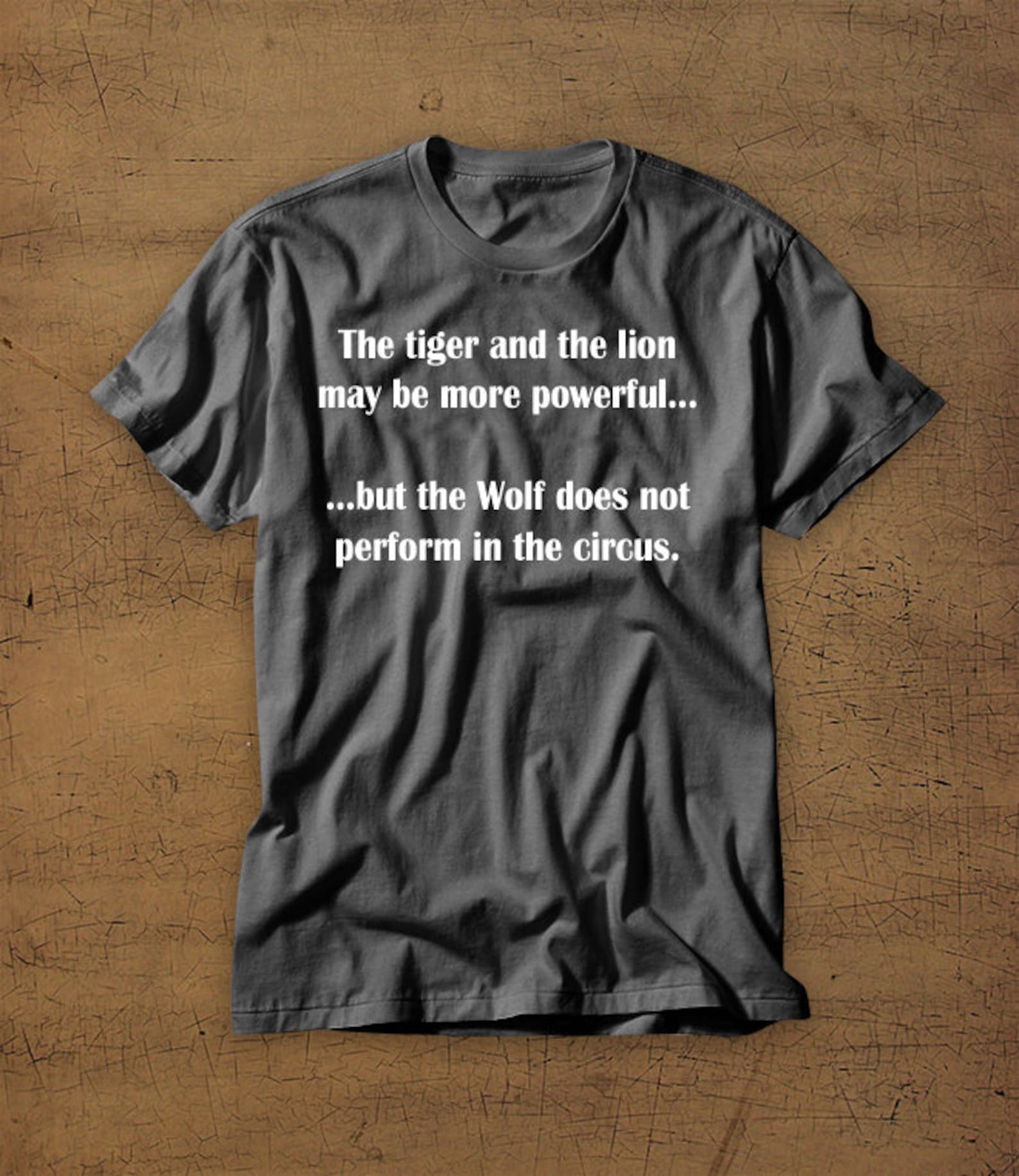 The Tiger And The Lion May Be More Powerful But The Wolf Does Not Perform In The Circus | Tshirt | Shirt | Success | Hustle | Entrepreneur M