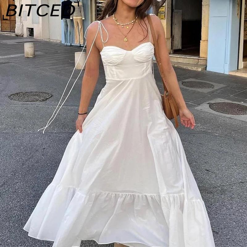 BITCED Spring Women's Collection: Elegant Solid-Color High-Waisted Strapless Dress with Flowing Skirt