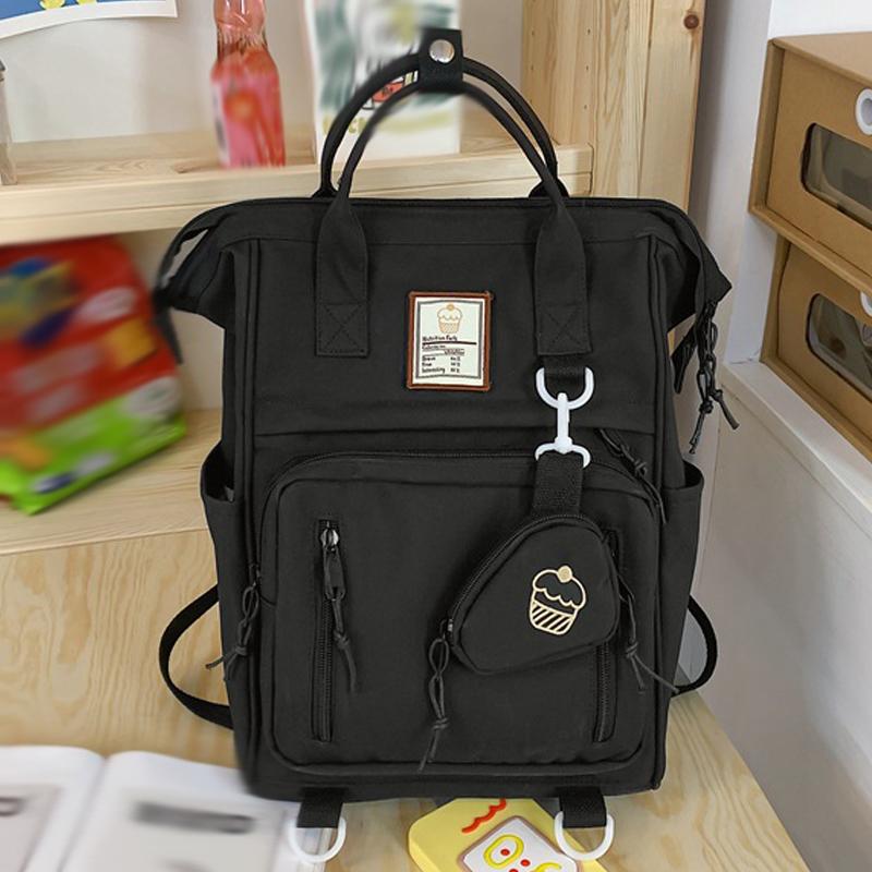 

2025 Новый японский литературный рюкзак Большой вместимости Легкий Водонепроницаемый Защита спины Школьный ранец Однотонный Повседневный Портативный рюкзак чёрный