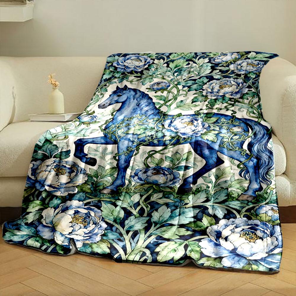 A blue horse entwined with vines and surrounded by blue peonies. for all seasons blanket lunch break throw gift