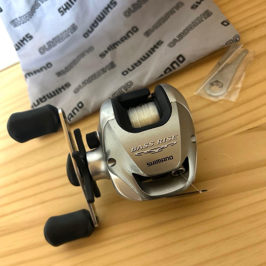 Used SHIMANO BASS RISE bait reel genuine bag with line