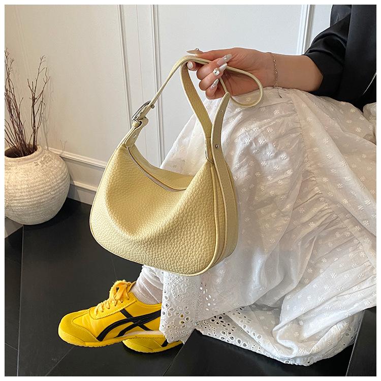 Simple and fashionable bag women's 2025 new Korean version versatile shoulder underarm bag niche high-end dumpling bag messenger bag