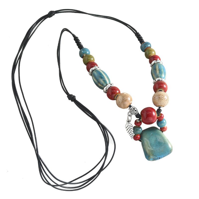 Ceramic axe pendant, long necklace, retro simple and versatile sweater chain.