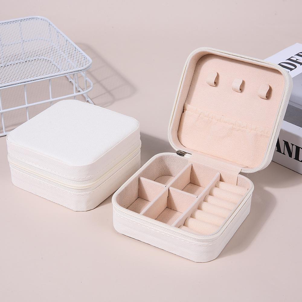 Mini-Schmuckaufbewahrungsbox, Reise-Schmuckschatulle für Ohrringe und Halsketten, kompakte Ringverpackung, Reißverschluss, Clamshell-Schmuckschatulle