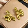 Stainless steel high-end gold earrings, niche design light luxury metal studs, temperament earrings