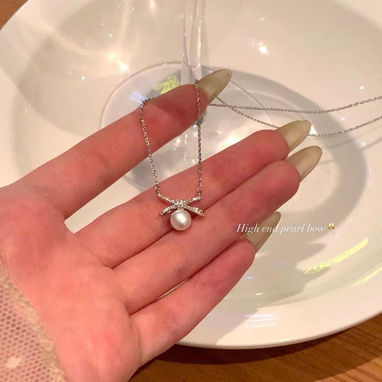 

Высококачественное ожерелье из титановой стали с бантом и жемчугом для женщин - модный корейский дизайн X1411 серебряный