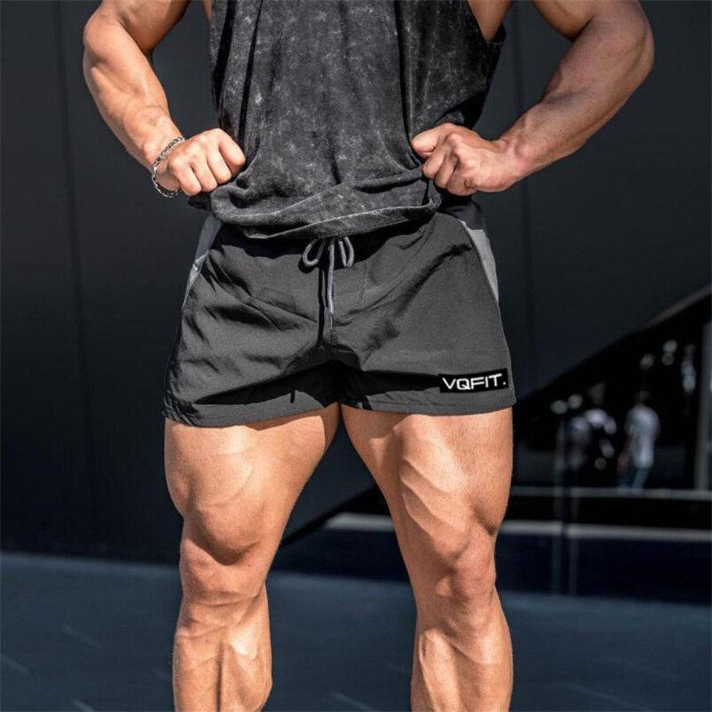Muscleguys Merke Fitness Shorts Herre Ny Sommer Kroppsbygging Treningssentre Korte bukser Joggere Trening Sports Shorts Streetwear Joggebukser