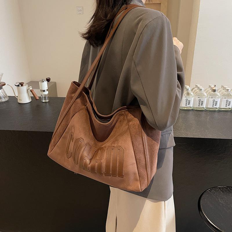 Leisure commuter tote bag women's large capacity 2025 new versatile shoulder shopping bag college student class bag